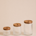 FRASCO DE VIDRIO X 3 UNIDADES TAPA DE MADERA9*15 CM/ 9*12 CM/ 9*9 CM( EMA 19-01)