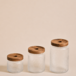 FRASCO DE VIDRIO X 3 UNIDADES TAPA DE MADERA9*15 CM/ 9*12 CM/ 9*9 CM( EMA 19-02)